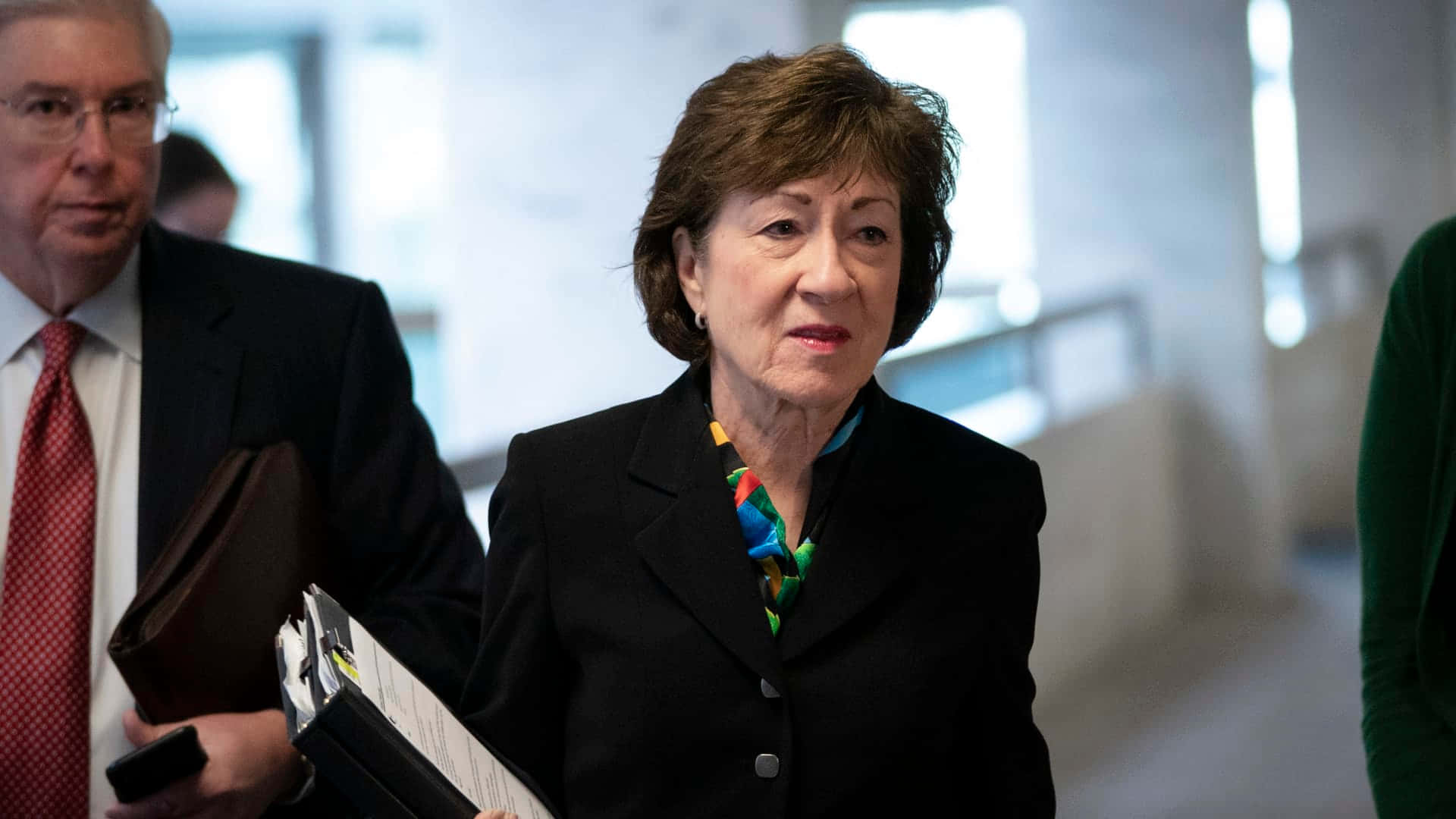 Susan Collins Black Suit Background