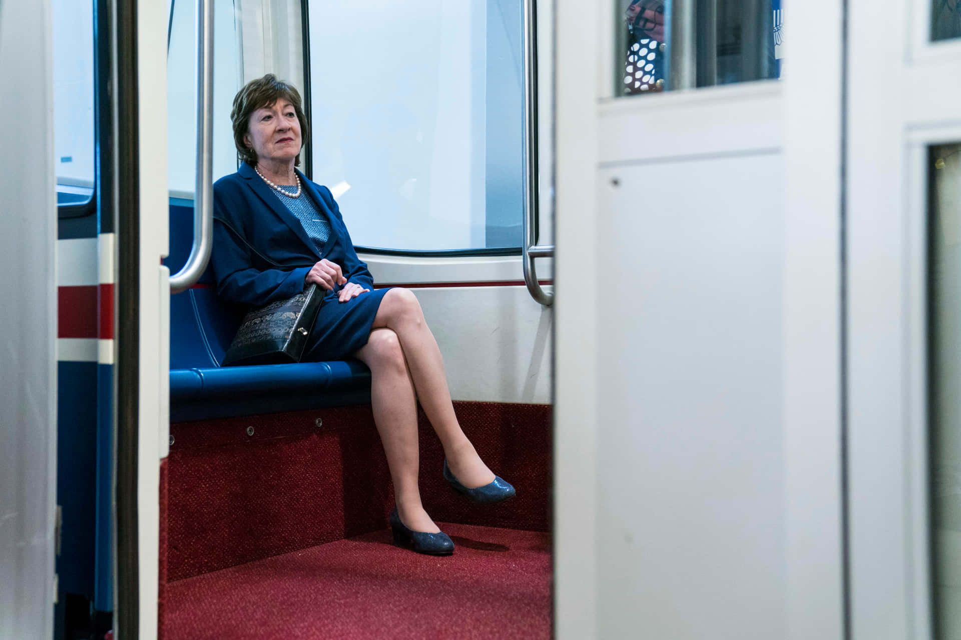 Susan Collins In Metro Background