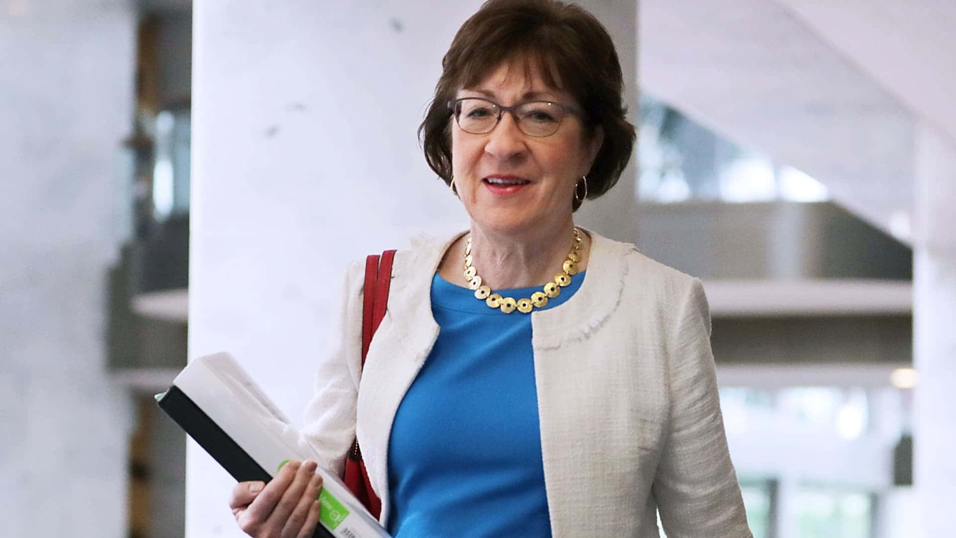 Susan Collins Looking Casual Background