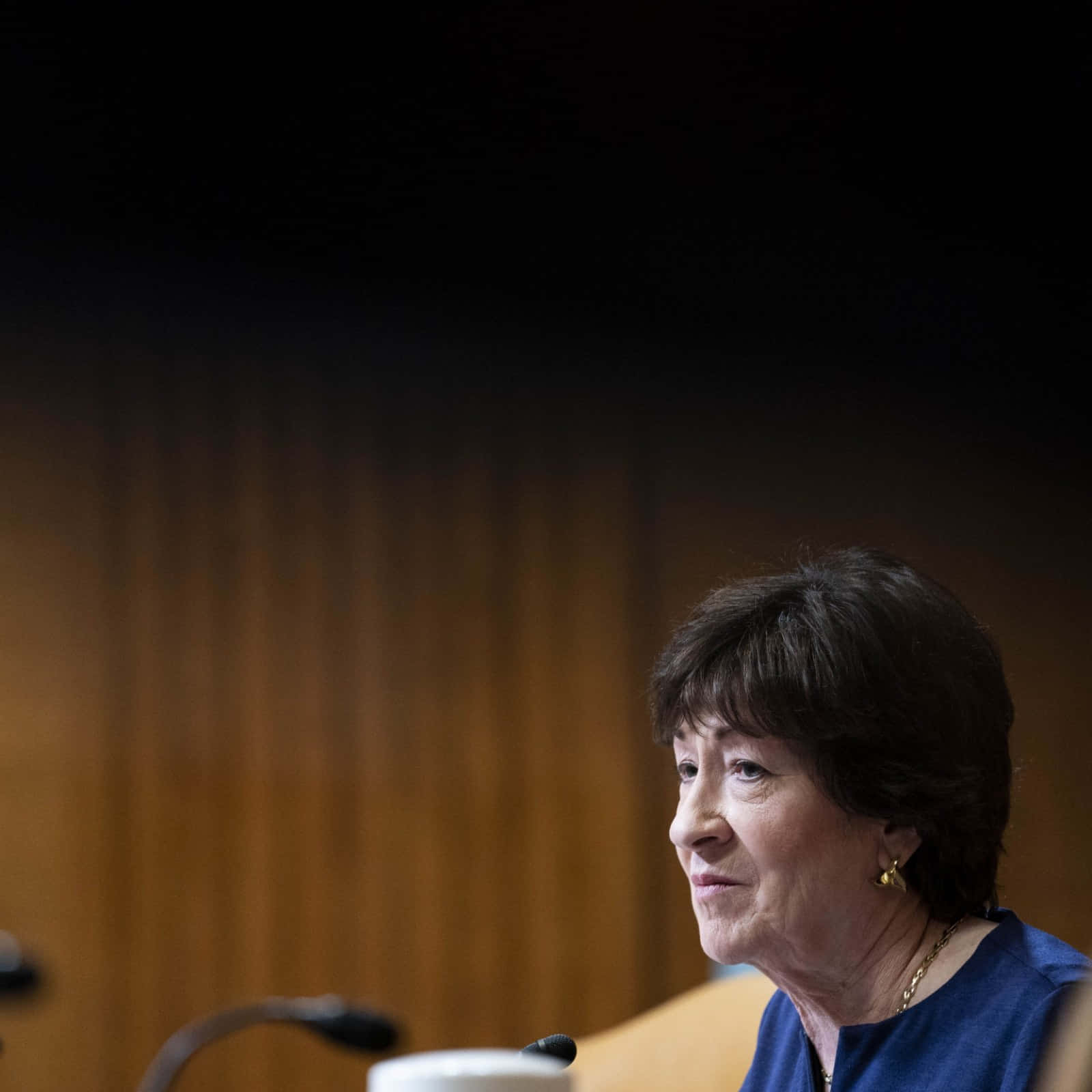 Susan Collins Speaking On The Phone Background
