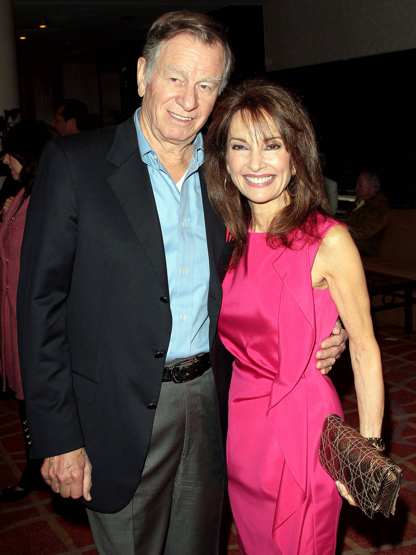 Susan Lucci And Helmut Huber Attending An Event Together Background