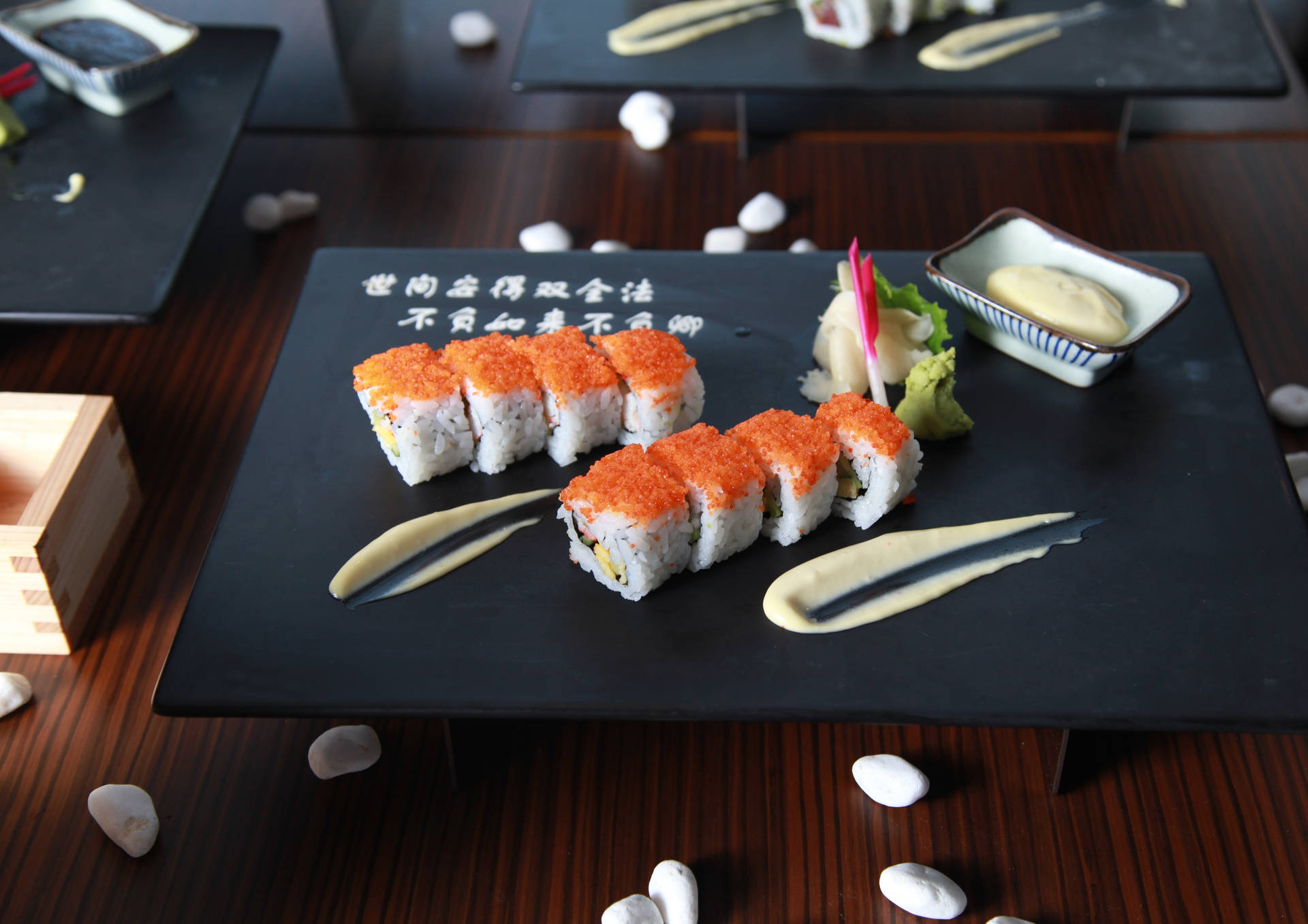 Sushi Roll In Black Plate