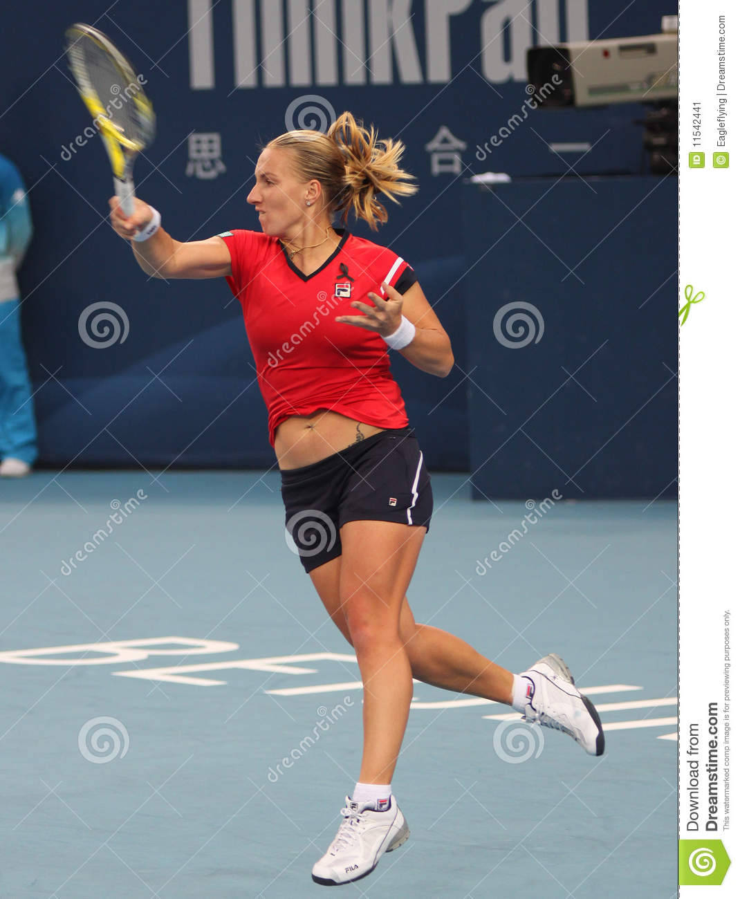 Svetlana Kuznetsova Swinging Racket Up Background