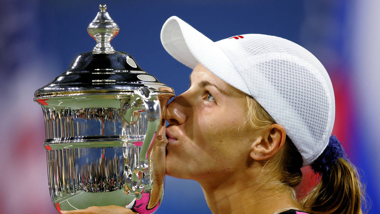 Svetlana Kuznetsova Triumphantly Kissing Her Trophy Background