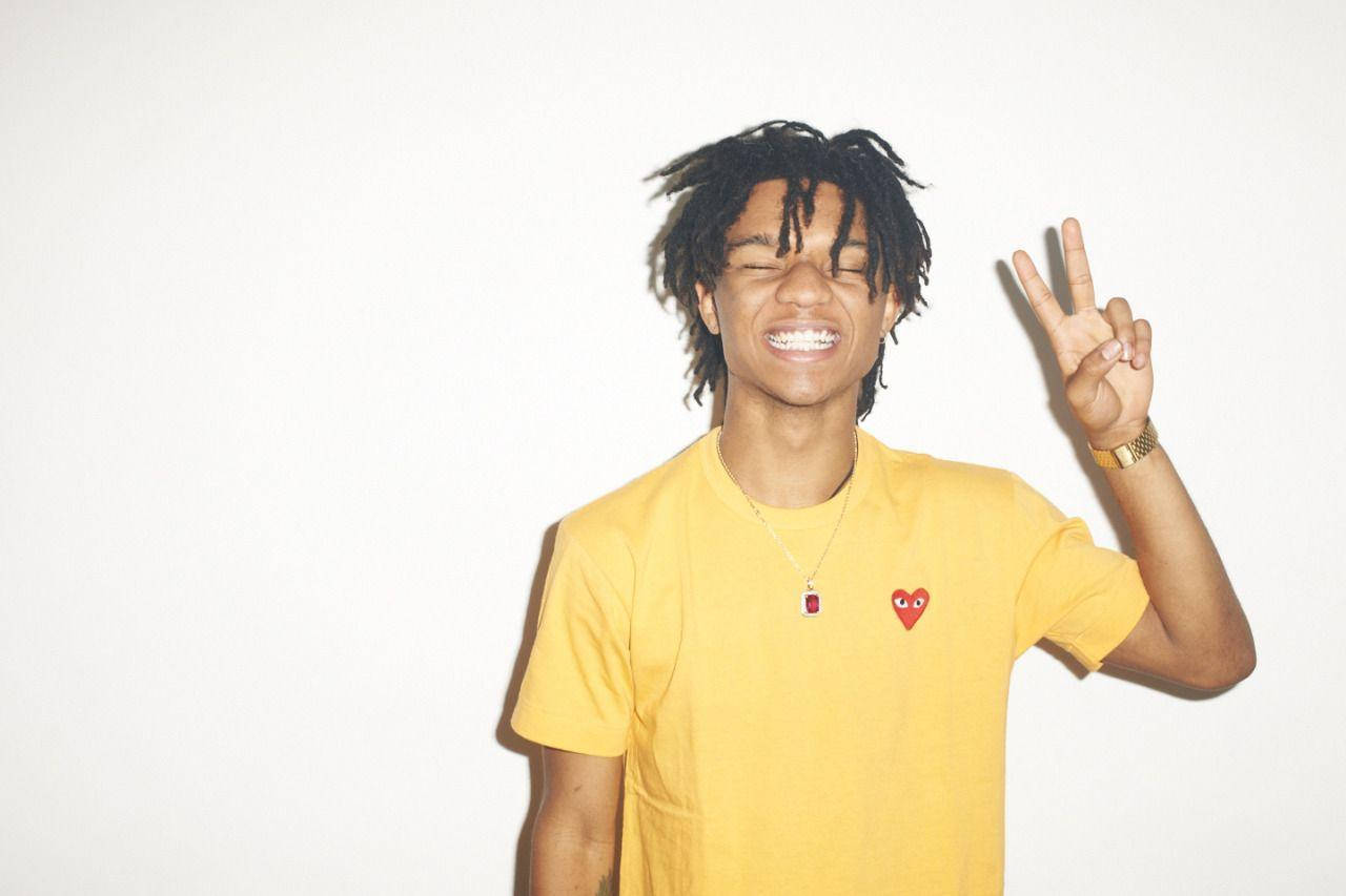 Swae Lee In Yellow Shirt Background