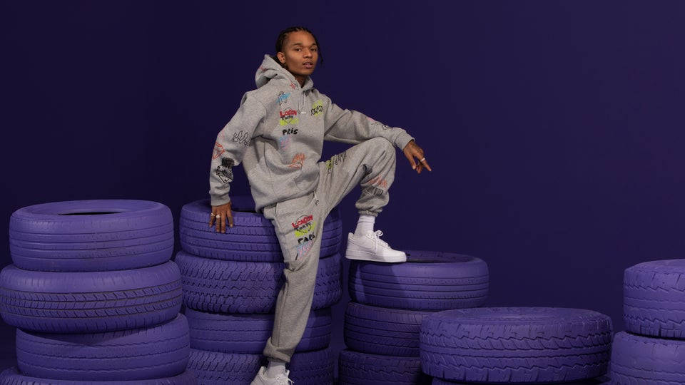 Swae Lee On Purple Tires Background