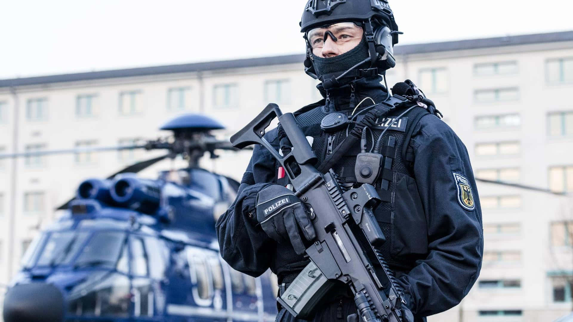 Swat Cop Officer With Helicopter In Germany