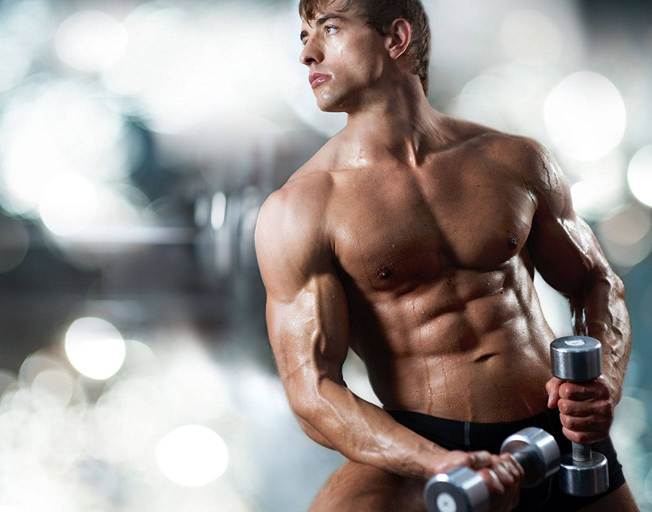 Sweaty Muscle Man With Dumbbells Background