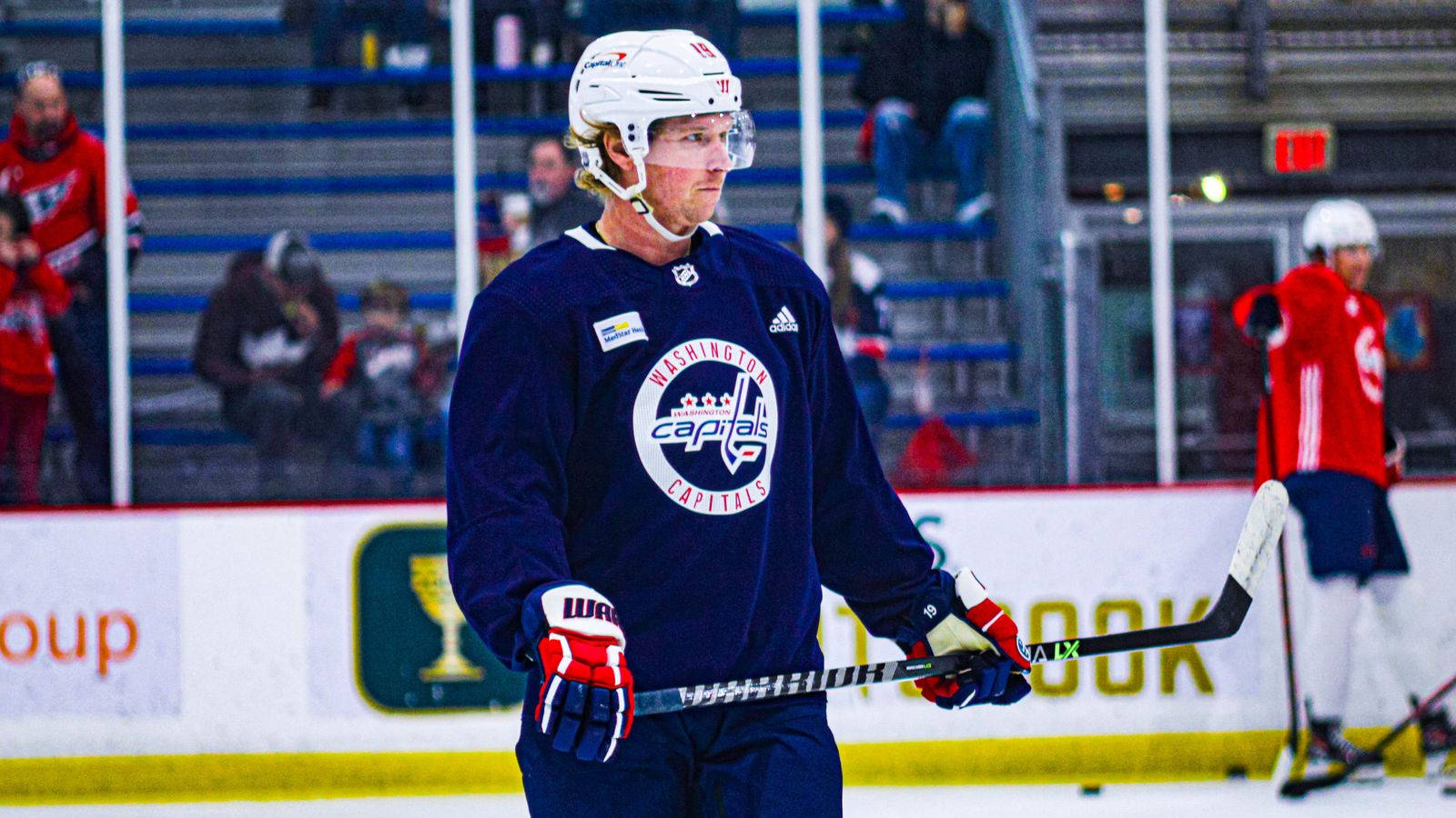 Swedish Athlete Nicklas Backstrom In Blue Jersey Background