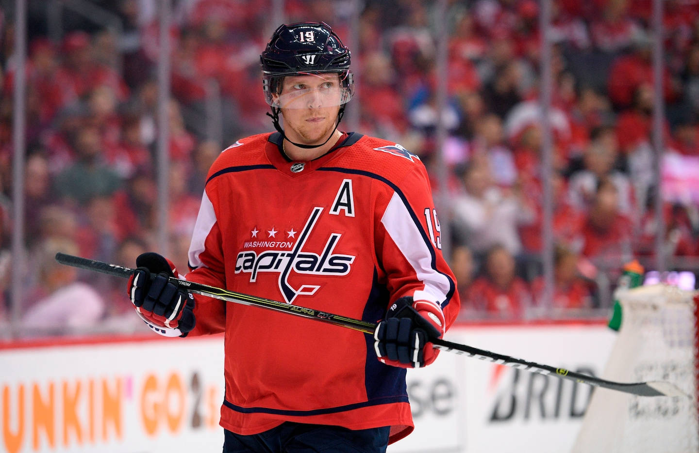 Swedish Athlete Nicklas Backstrom In Face-off Against Tampa Bay Lightning Background