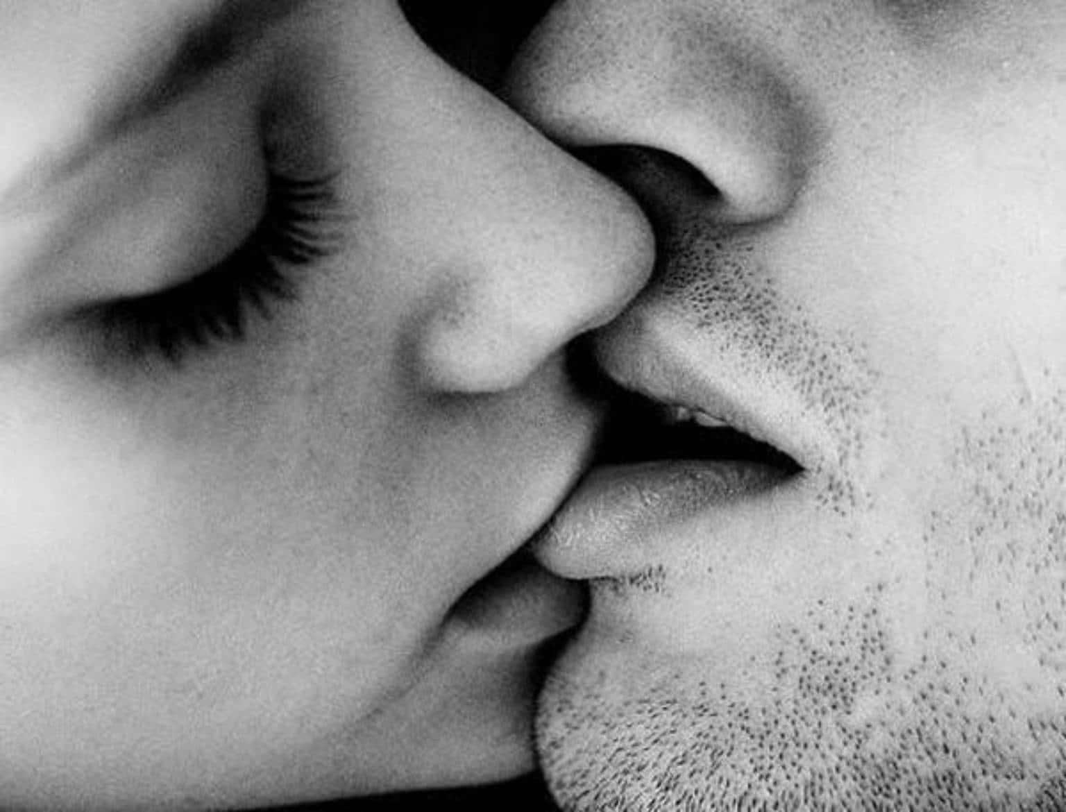 Sweet Couple Kissing Each Other's Lips Background