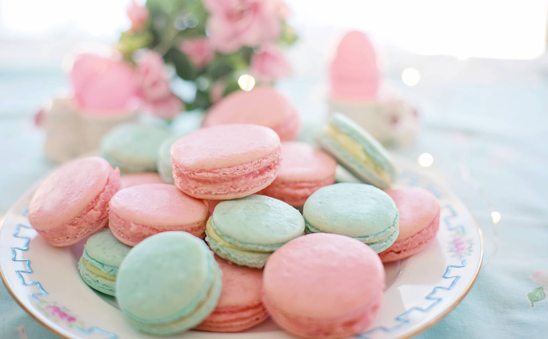 Sweet Delight In Pastel: Captivating Macaroons In Soft Colors Background