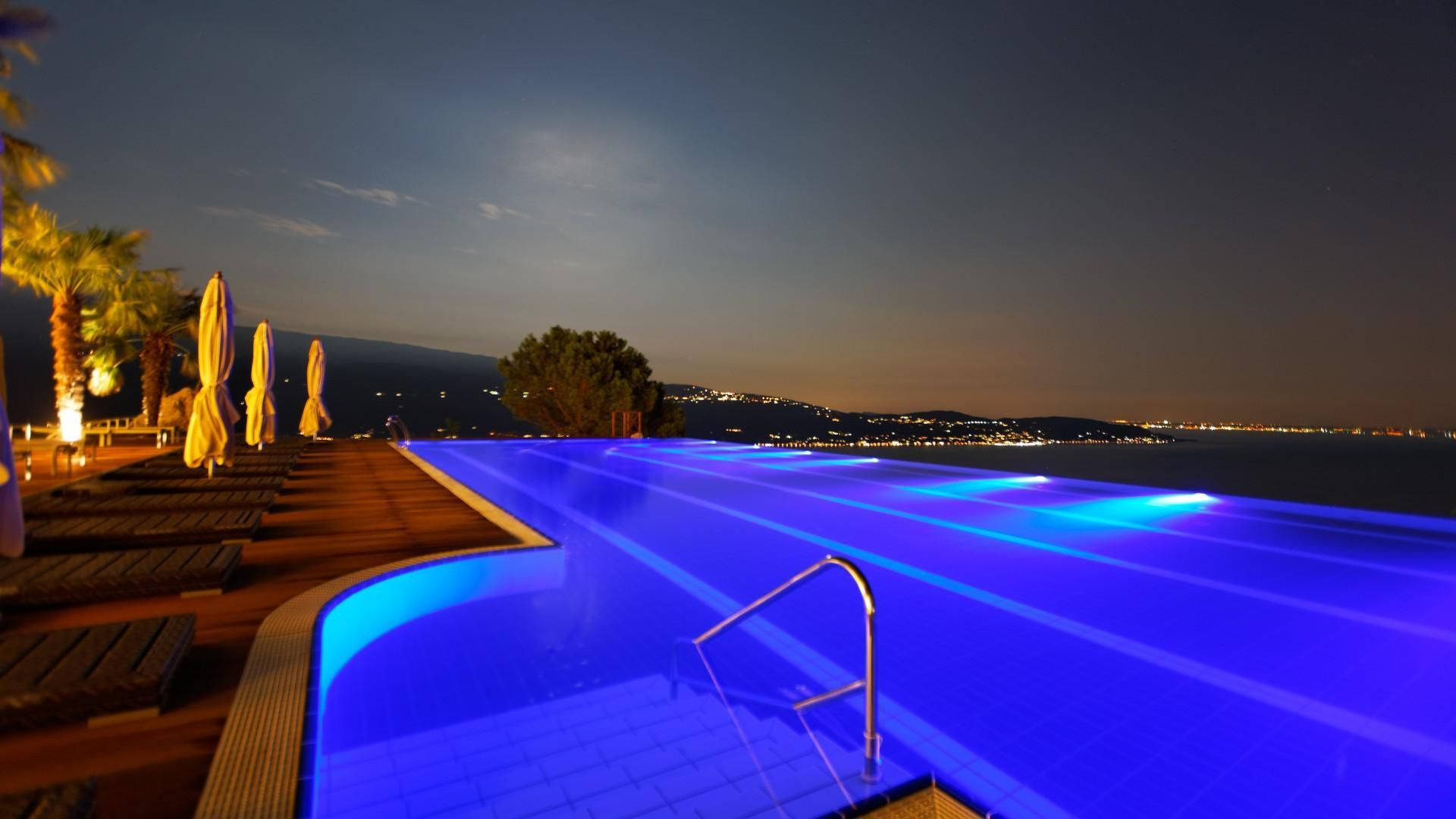 Swimming Pool City Lights Background