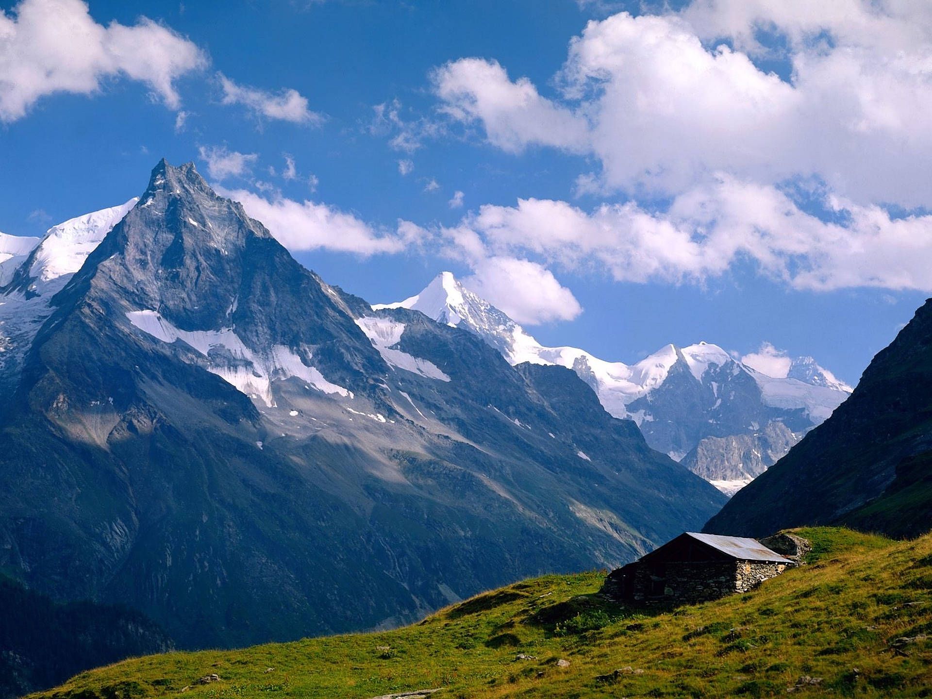 Swiss Alps And Calm Sky Background
