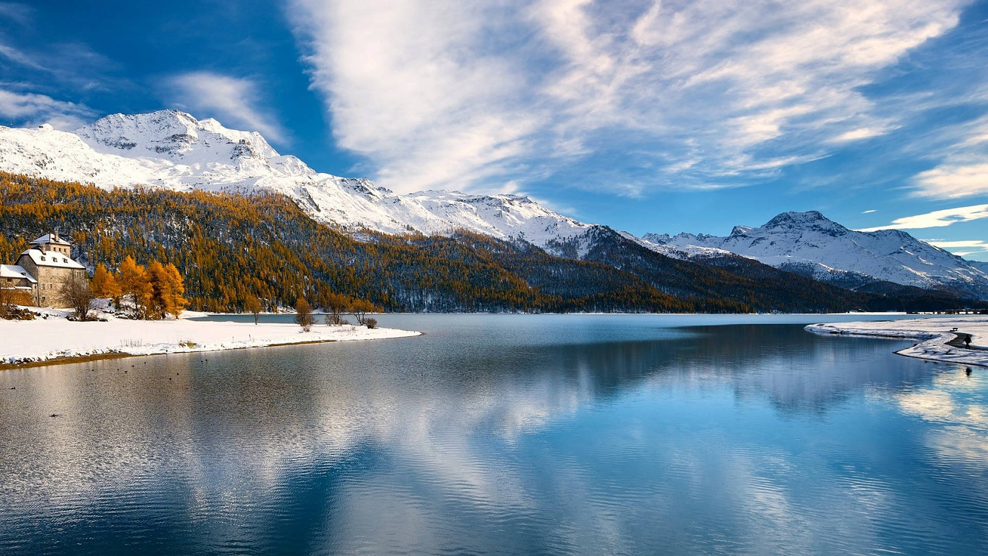Swiss Alps Lake During Winter Background