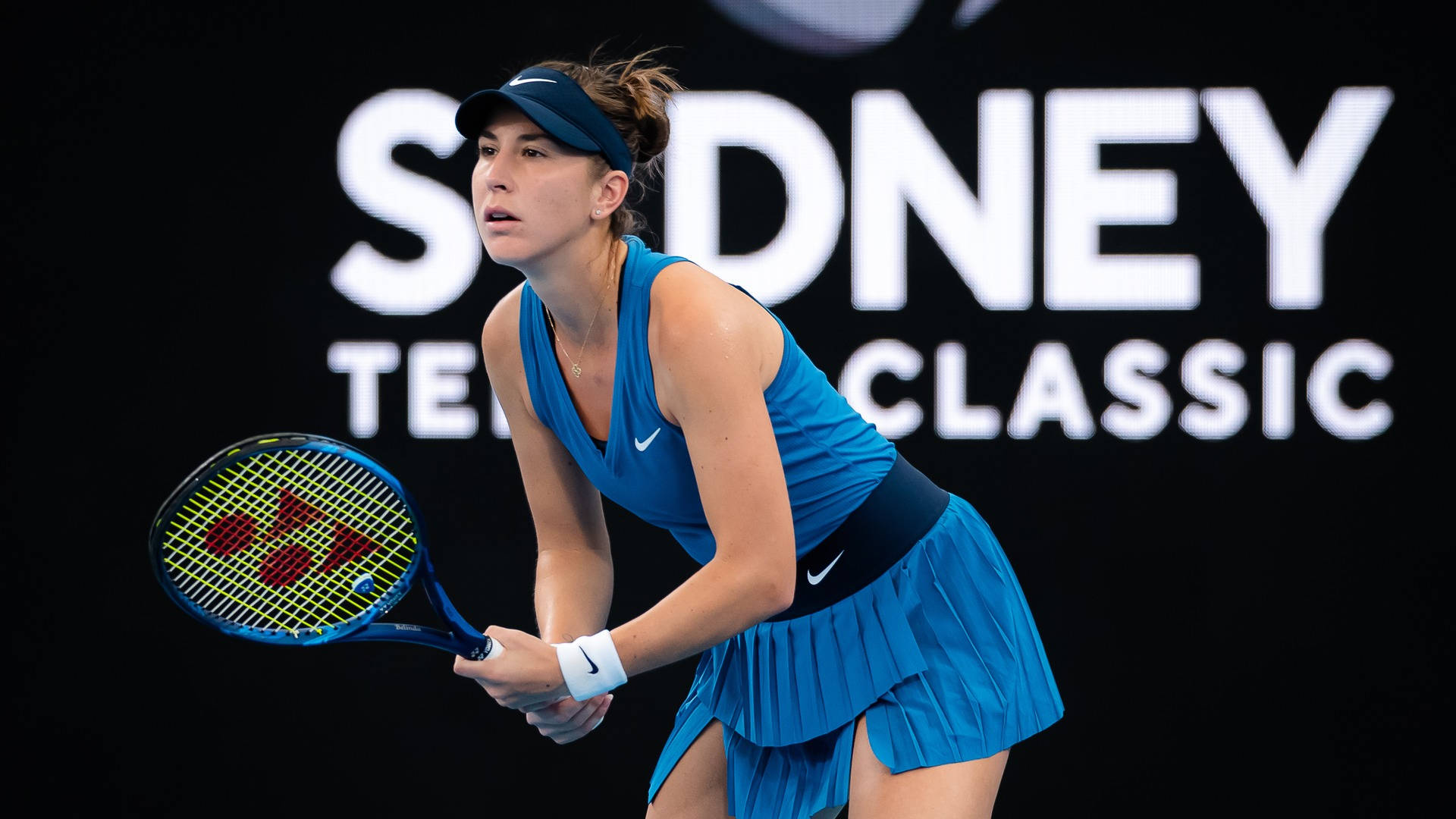 Swiss Tennis Sensation Belinda Bencic In Action Background