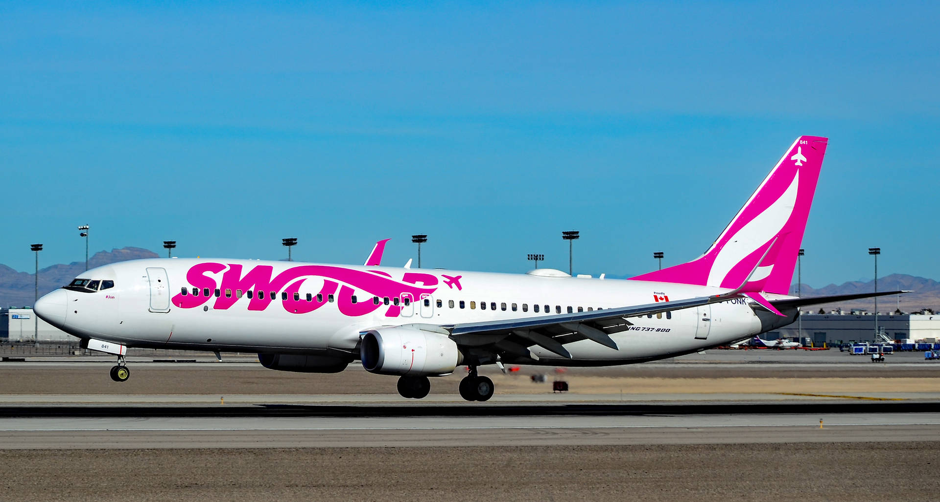 Swoop Airlines Airbus On The Runway Background