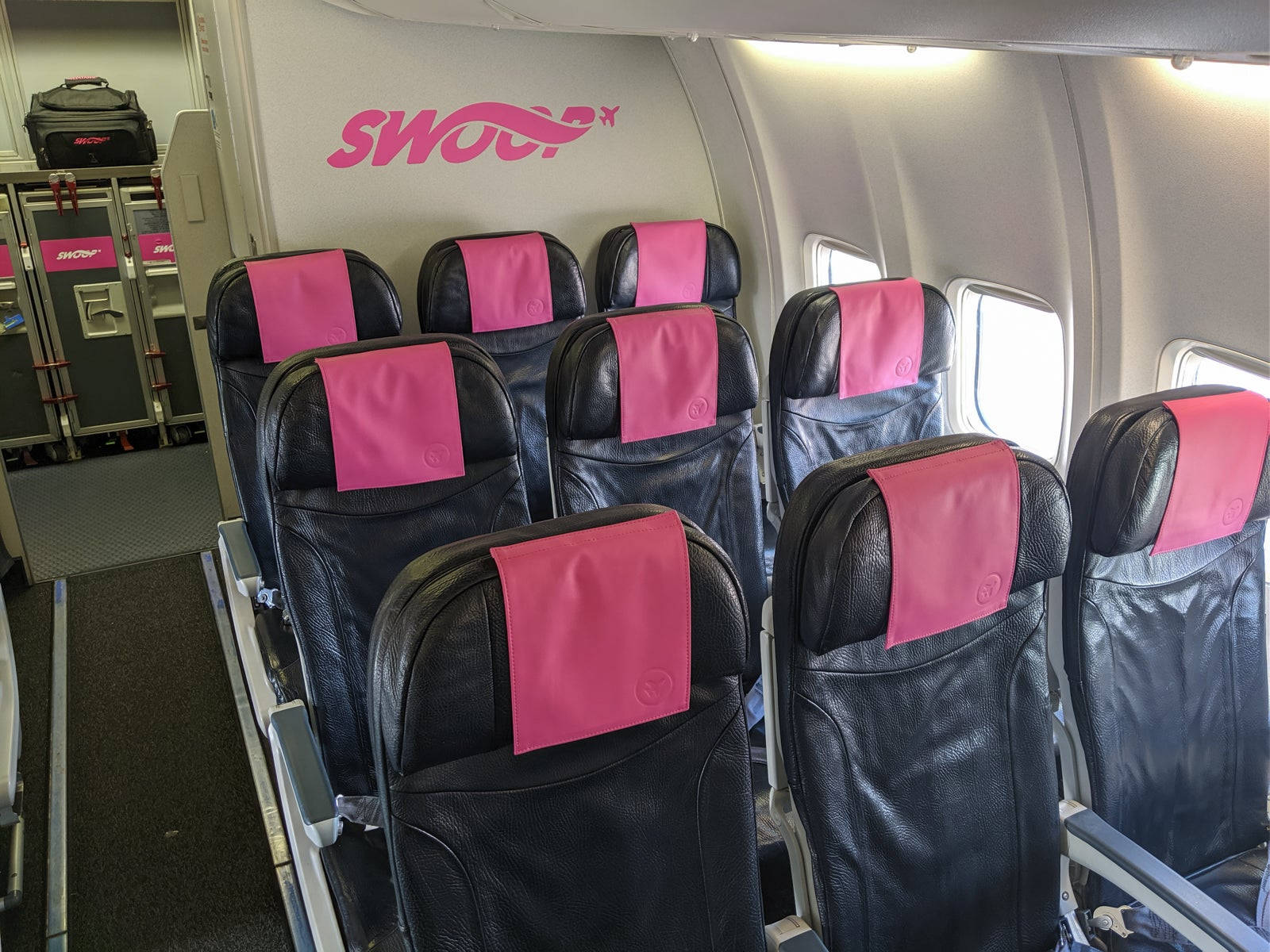 Swoop Airlines' Elegant Passenger Seating Background