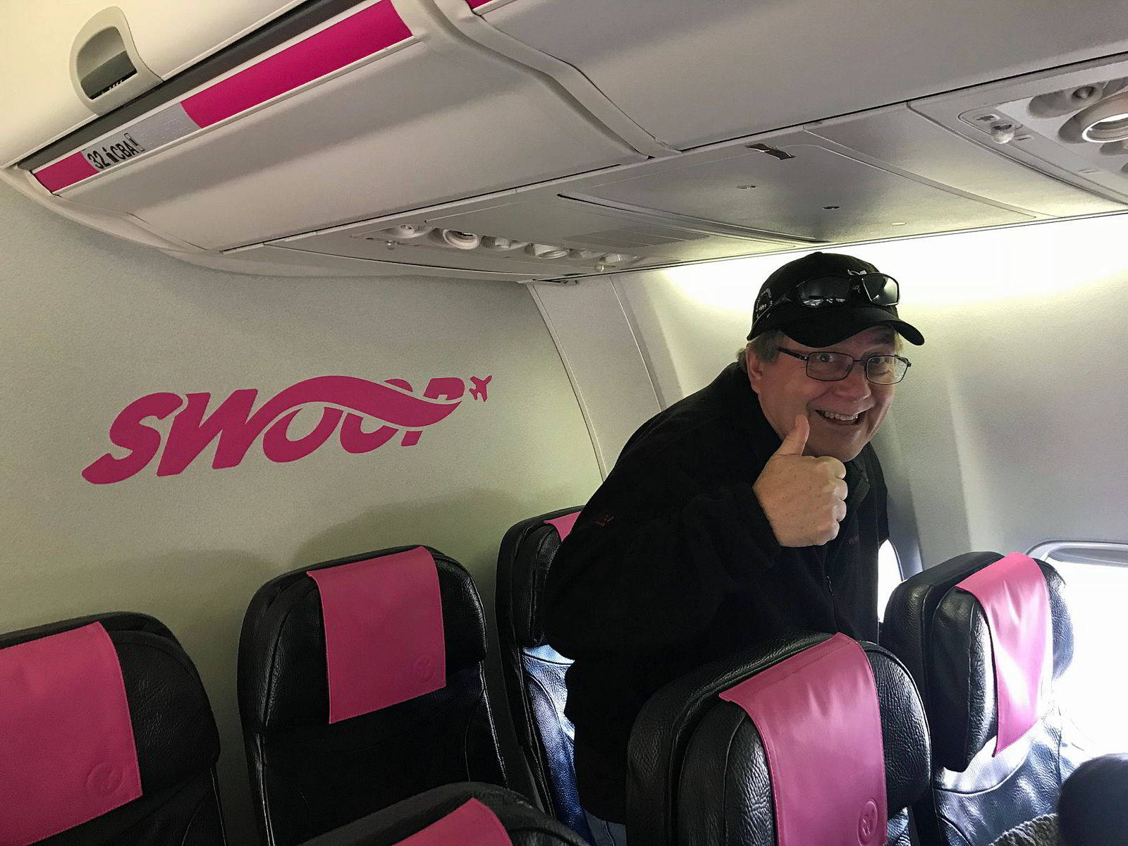 Swoop Airlines Happy Passenger Background