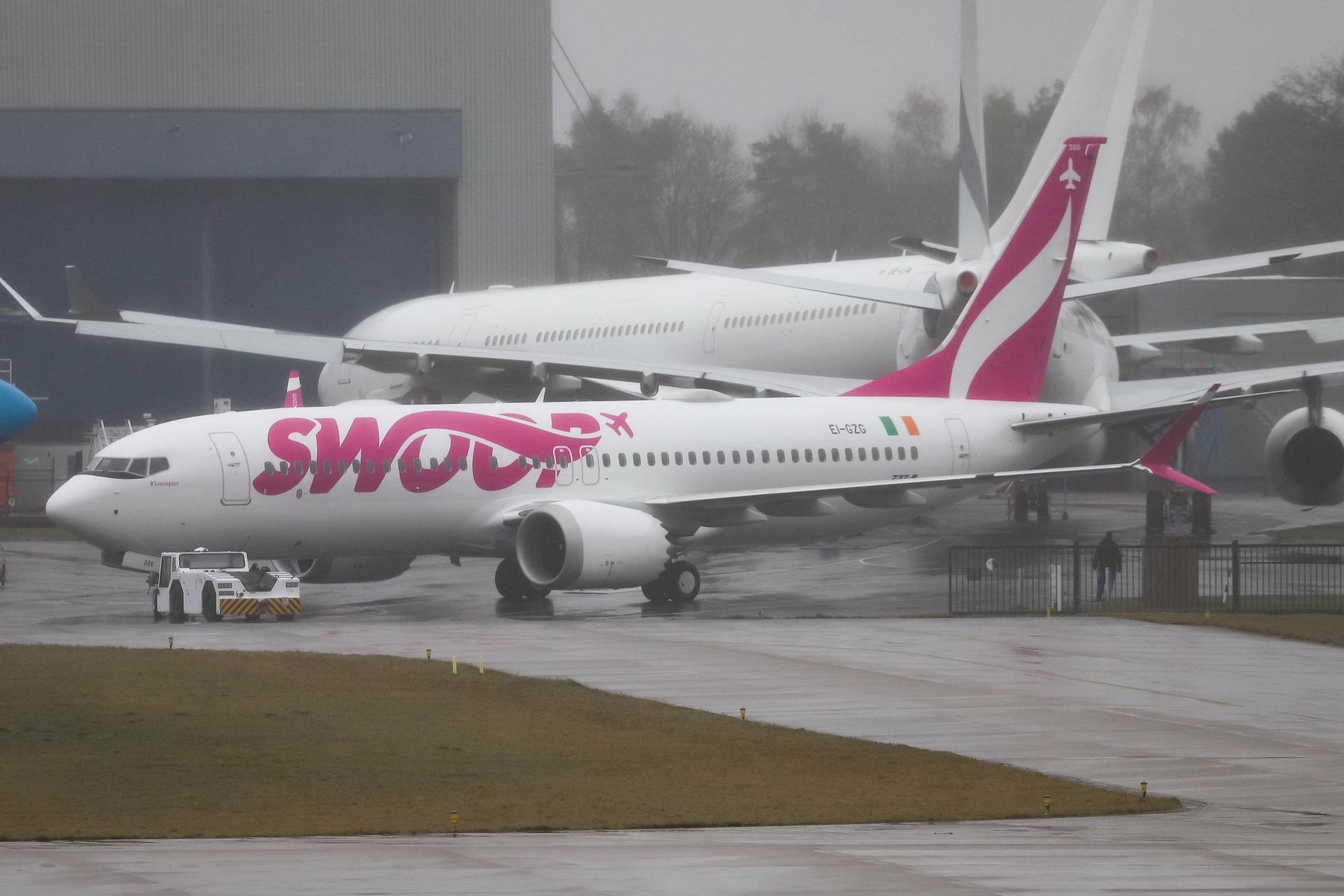 Swoop Airlines Rainy Flight Background