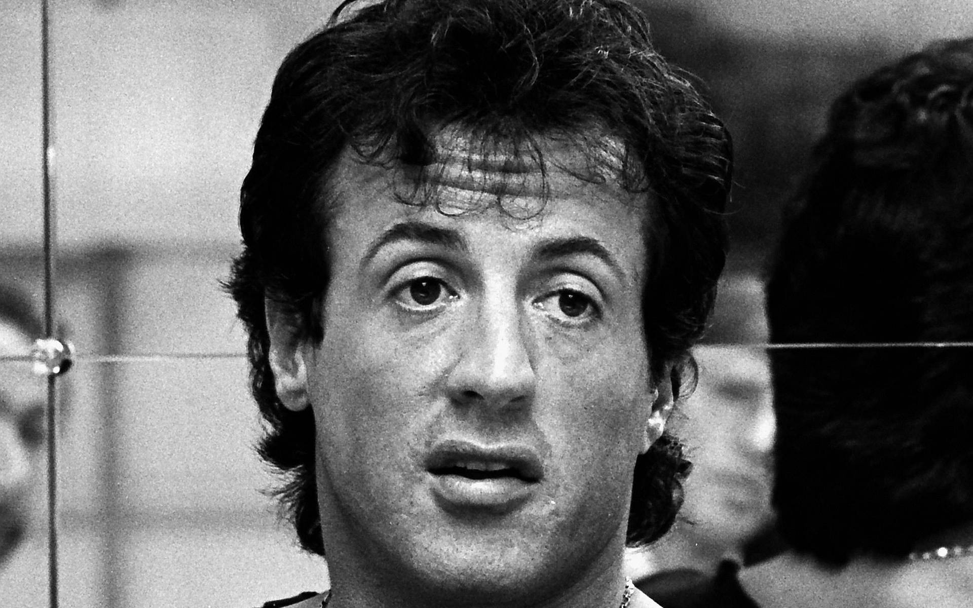 Sylvester Stallone Greyscale Male Face Background