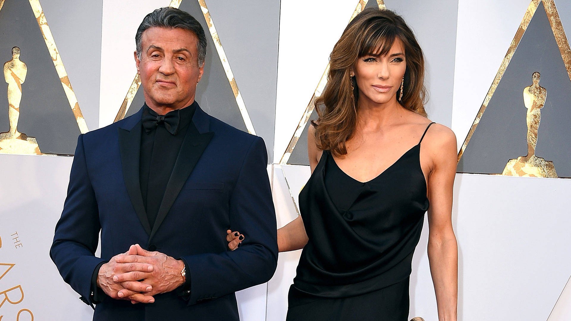 Sylvester Stallone Hands Together Wife Background