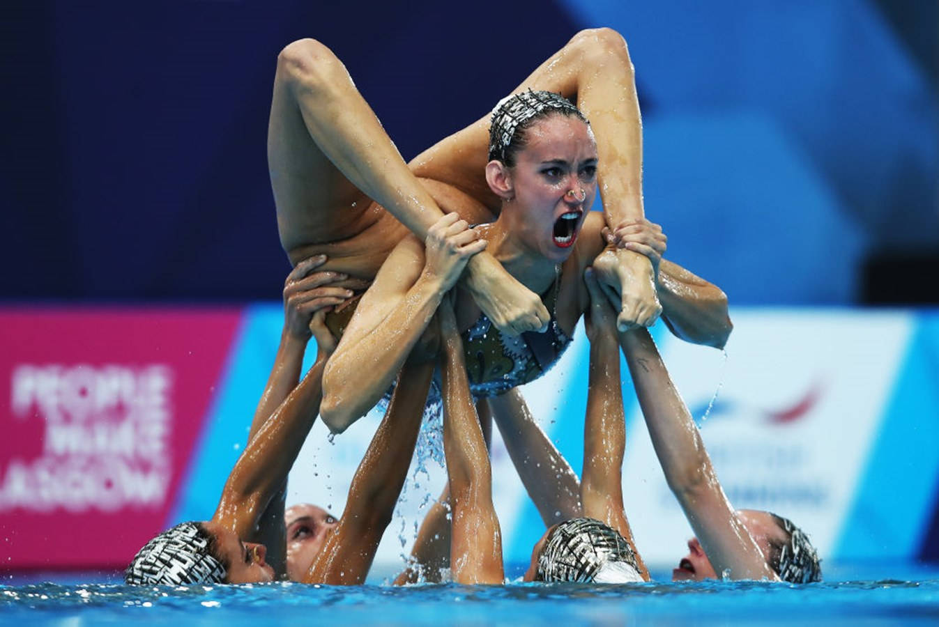 Synchronized Swimming Performance At The Olympics Background