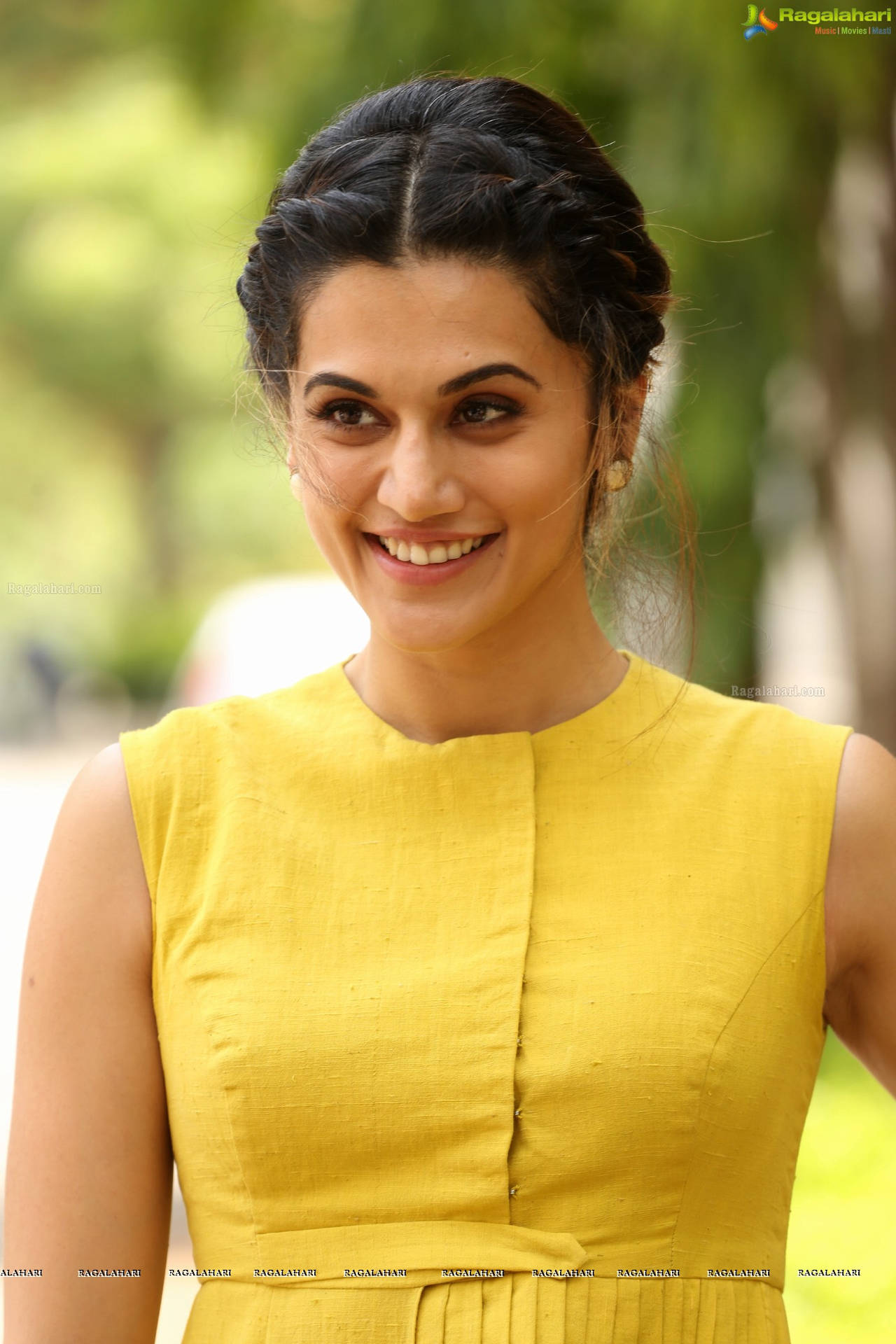 Taapsee Pannu In Yellow Dress Background