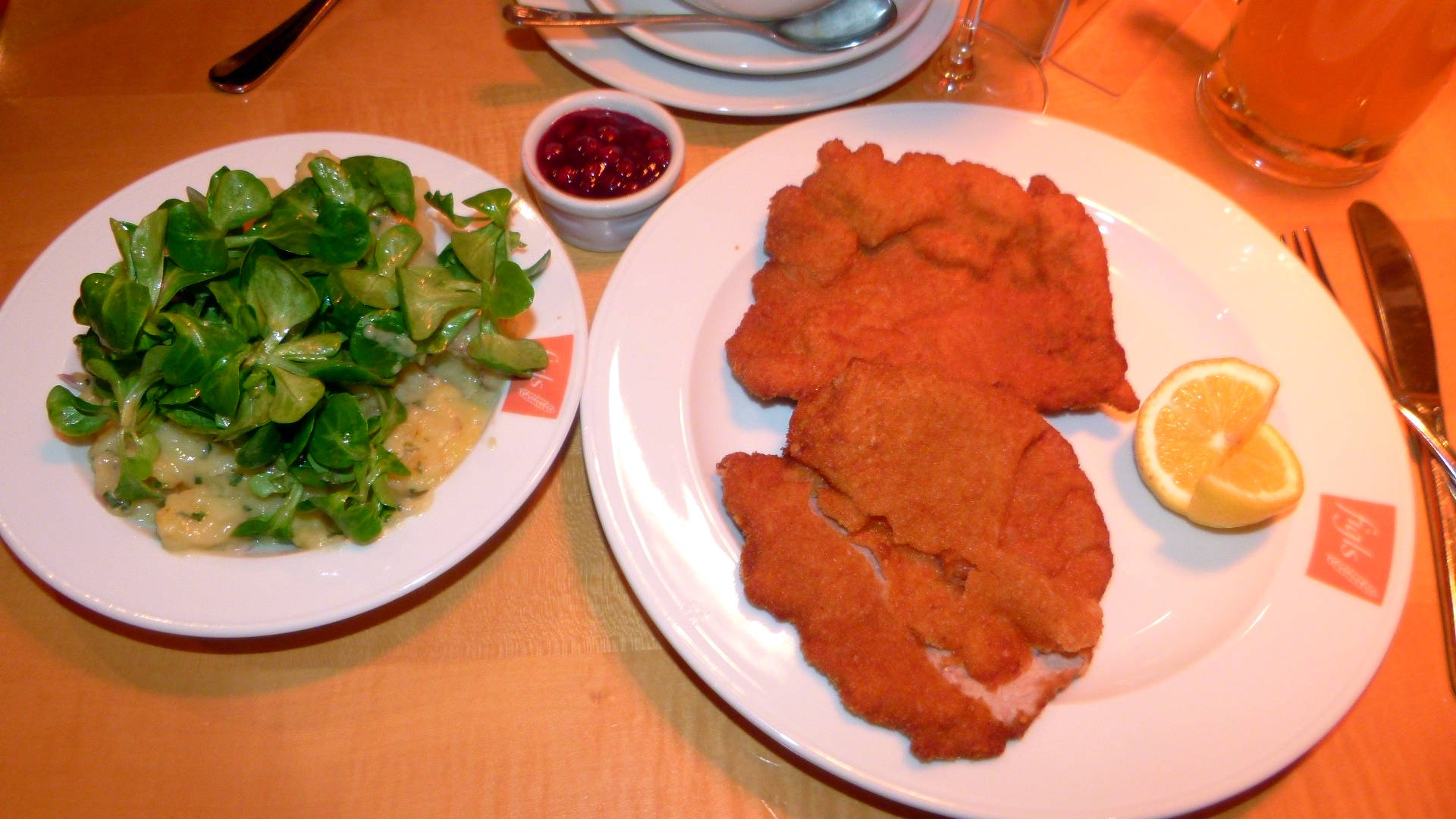 Table Setting With Wiener Schnitzel Background