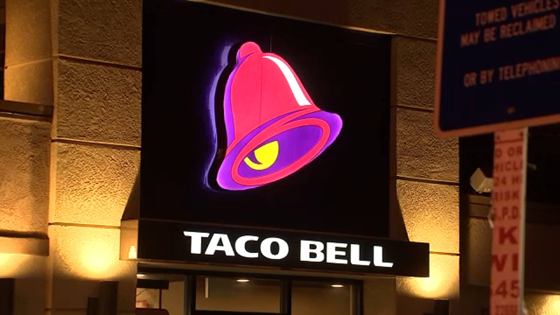 Taco Bell Glowing Signage Background