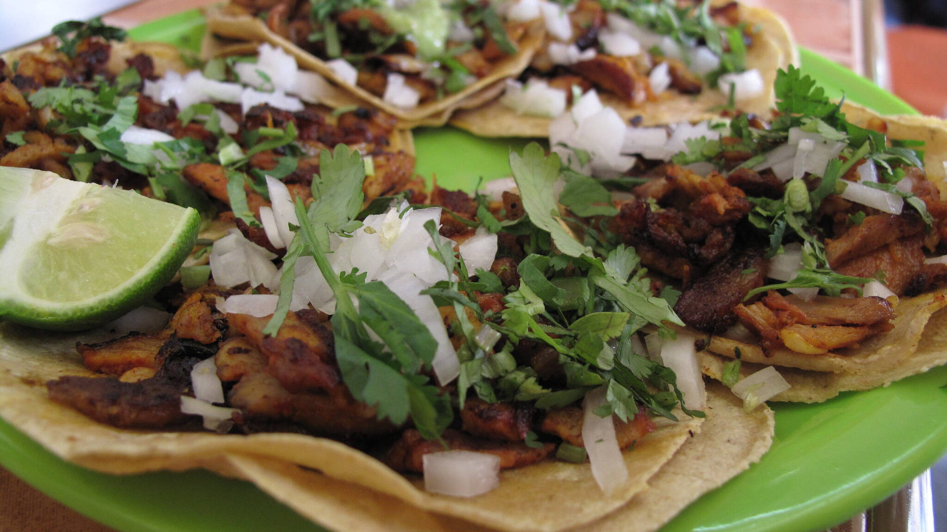 Tacos Al Pastor With Fresh Cilantro Background