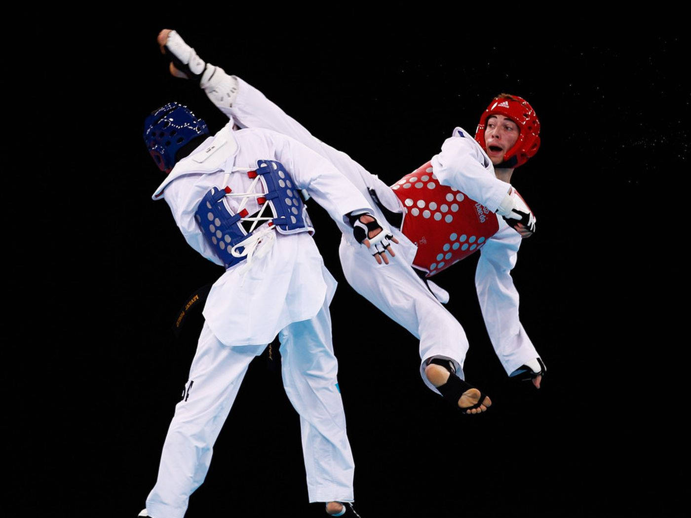 Taekwondo Battle Jump Reverse Side Kick Background