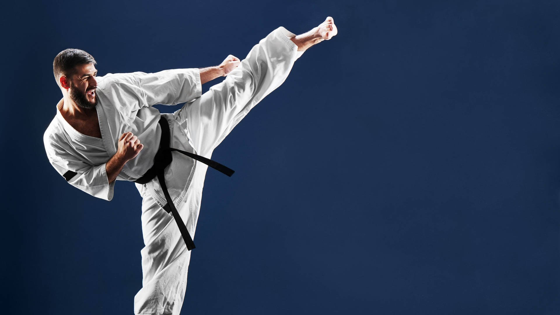 Taekwondo Player Black Belt High Kick Background