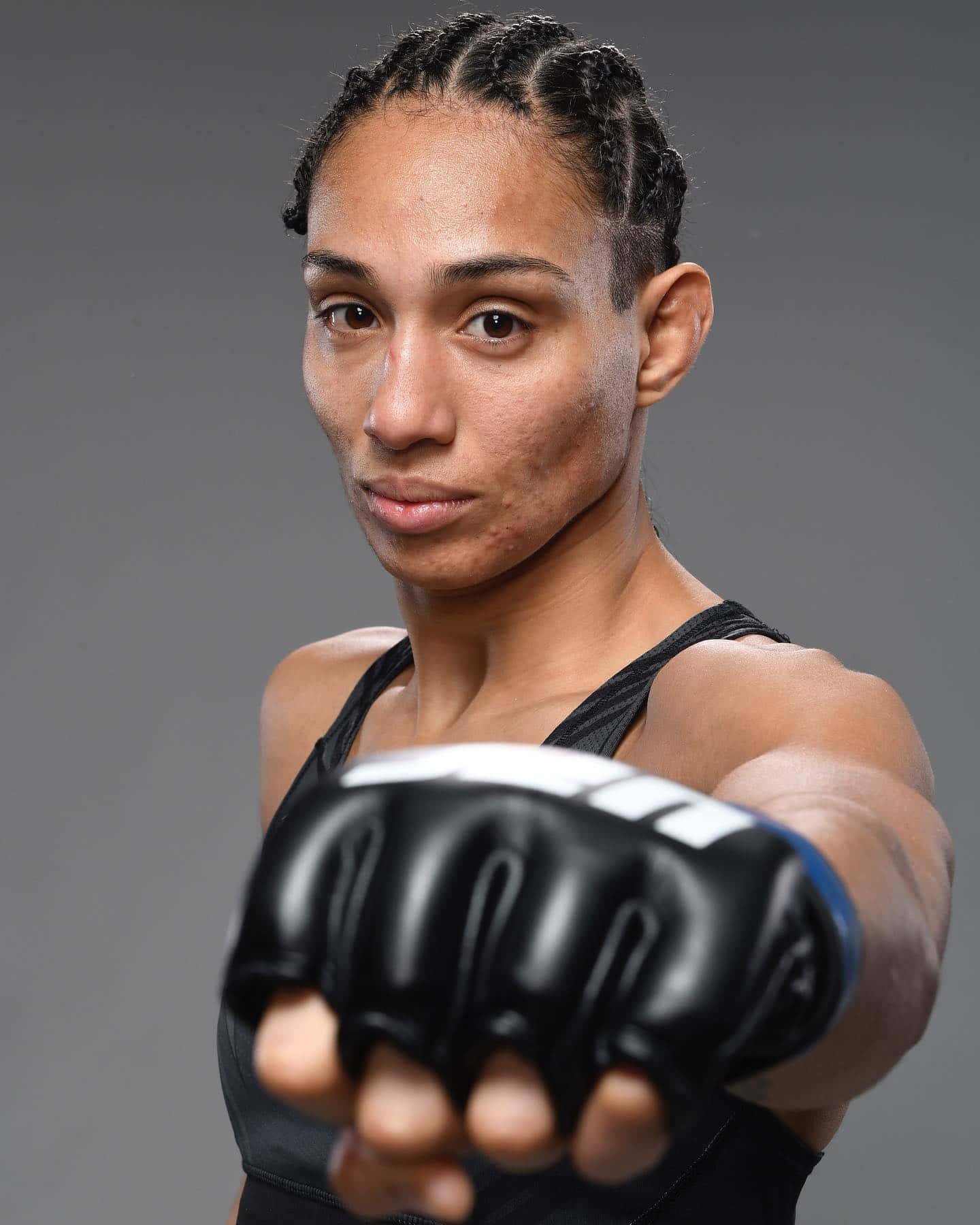 Taila Santos Punching Forward Background