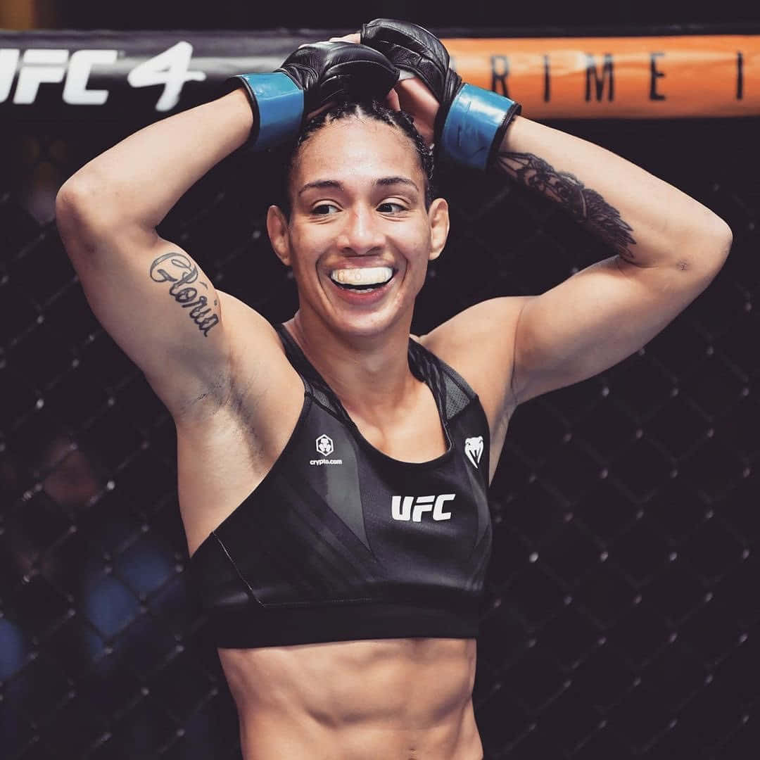 Taila Santos Smiling With Hands On Head