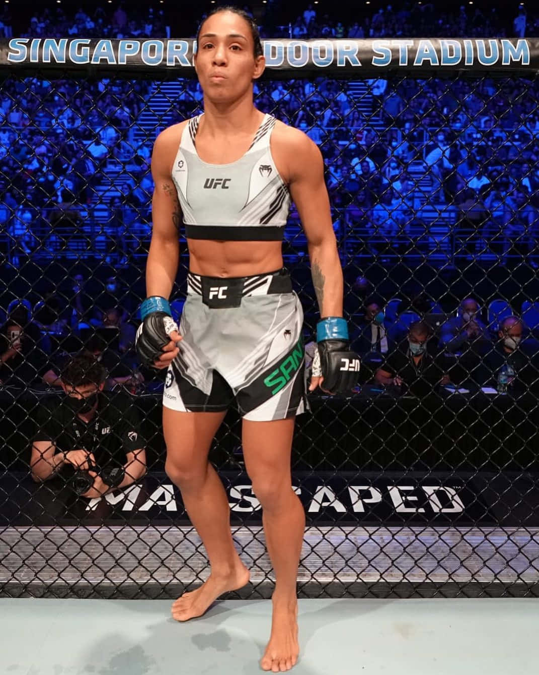 Taila Santos Standing Inside The Octagon