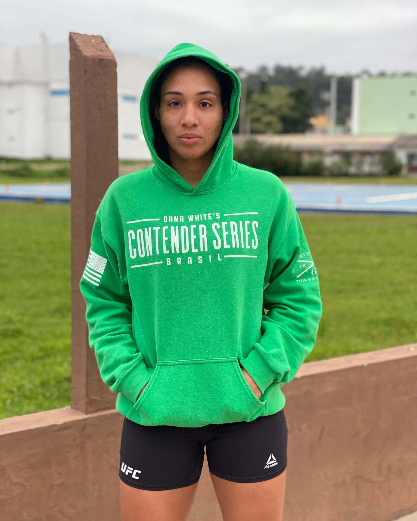 Taila Santos Wearing A Green Hoodie