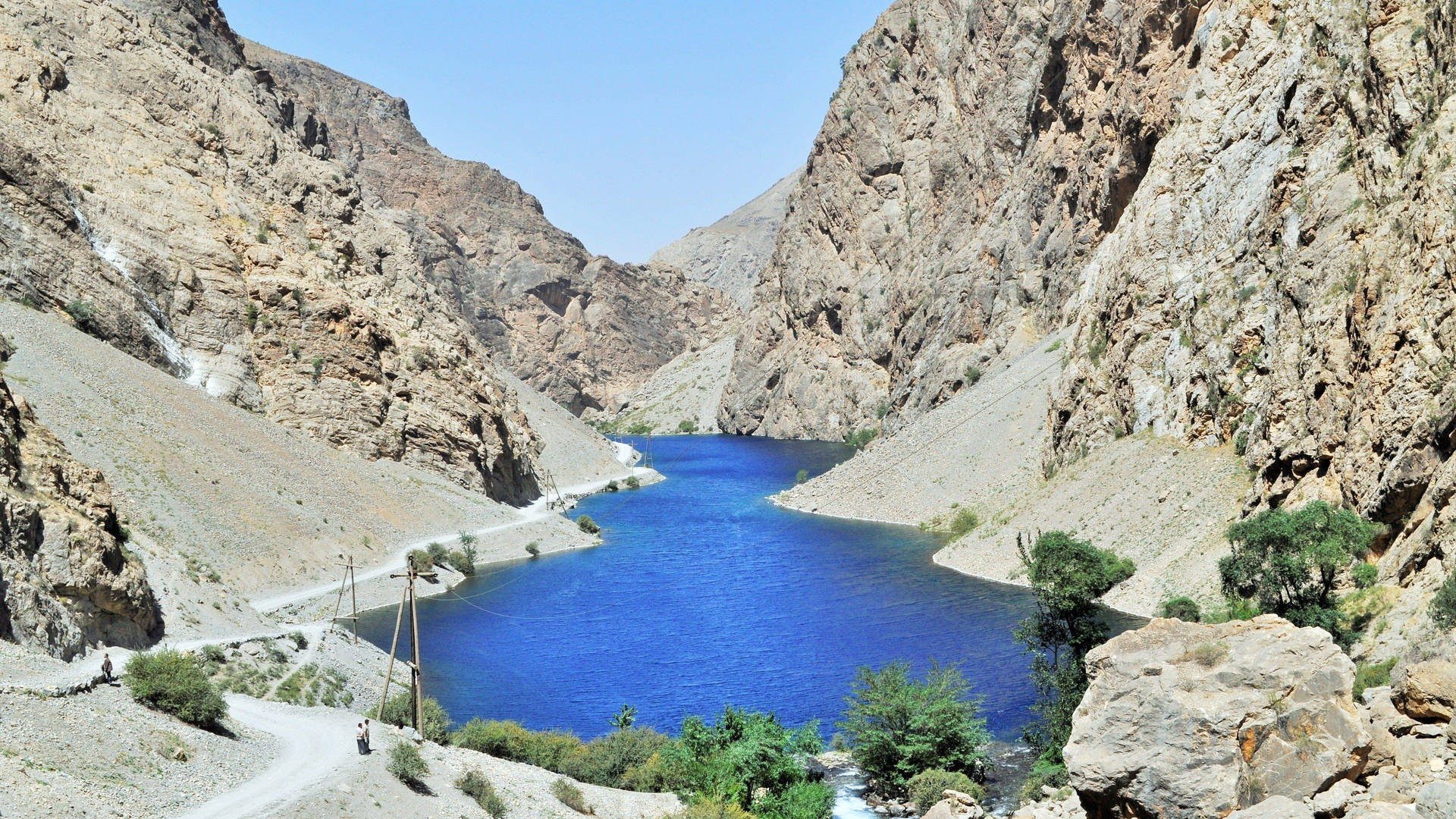 Tajikistan Blue River By The Mountains Background