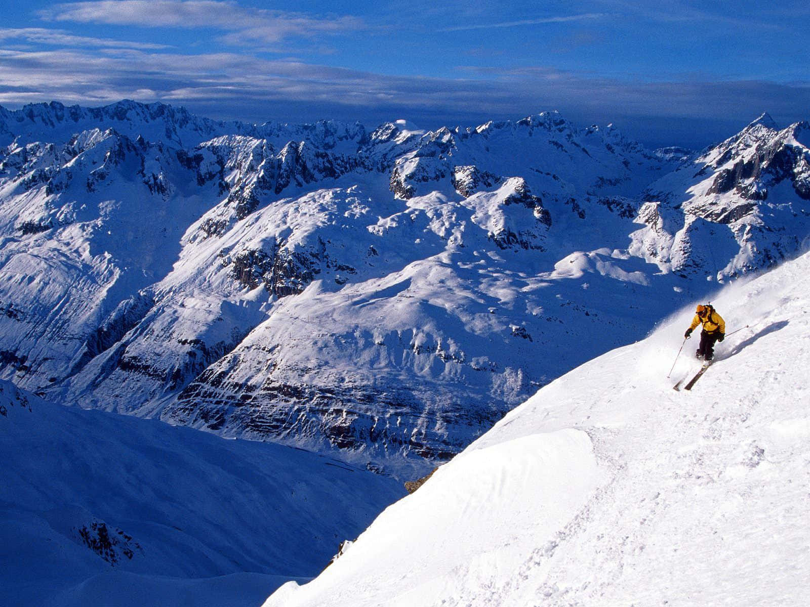 Take A Break And Relax In A Beautiful Snow-covered Ski Mountain. Background