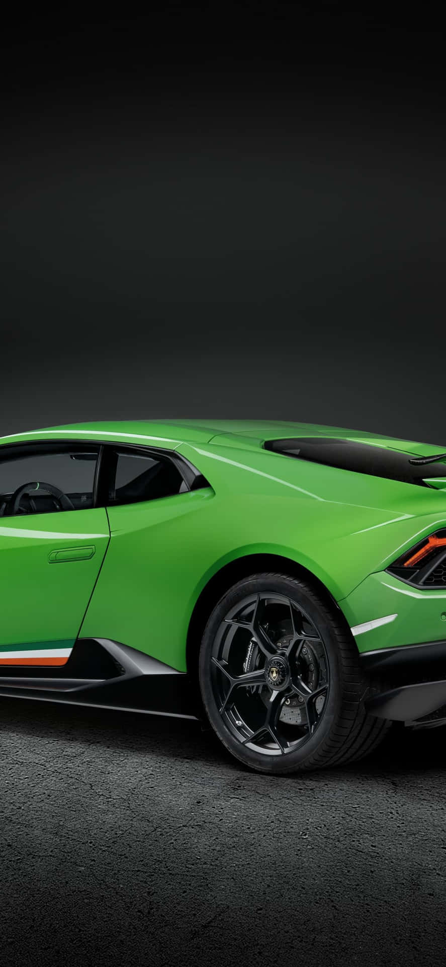 “take A Ride In Style With The Green Lamborghini Iphone” Background