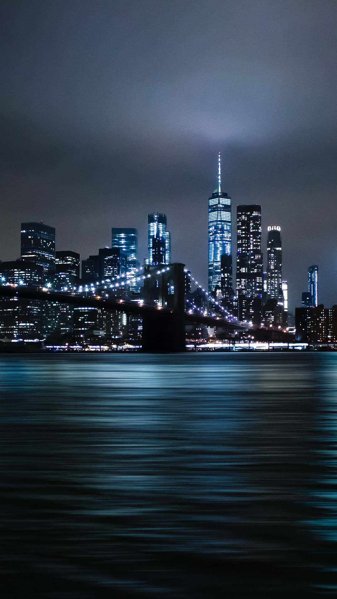 Take A Stroll Through The Vibrant And Bustling Streets Of New York City At Night. Background