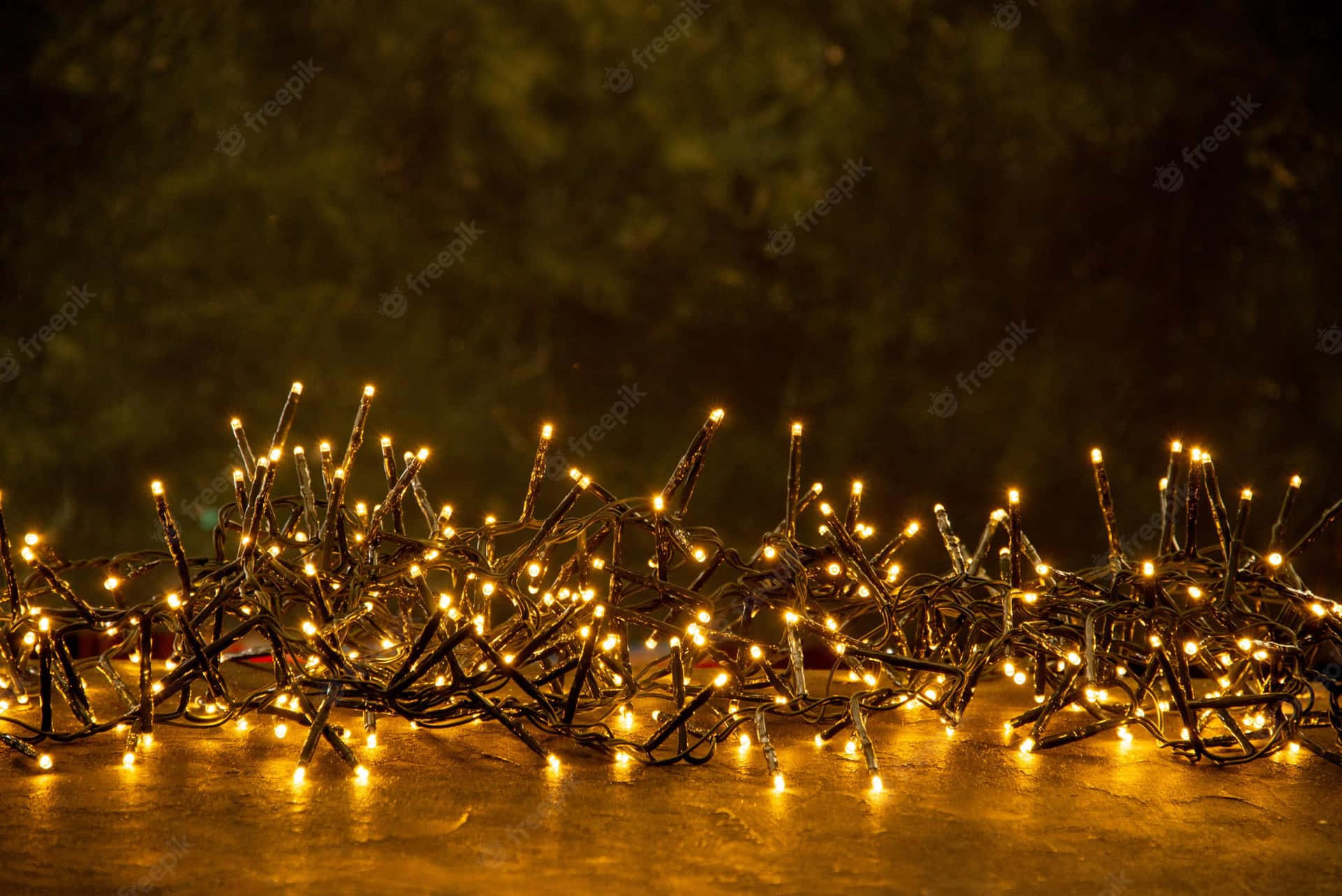 Take A Stroll Under The Enchanting Glow Of These Christmas Lights. Background
