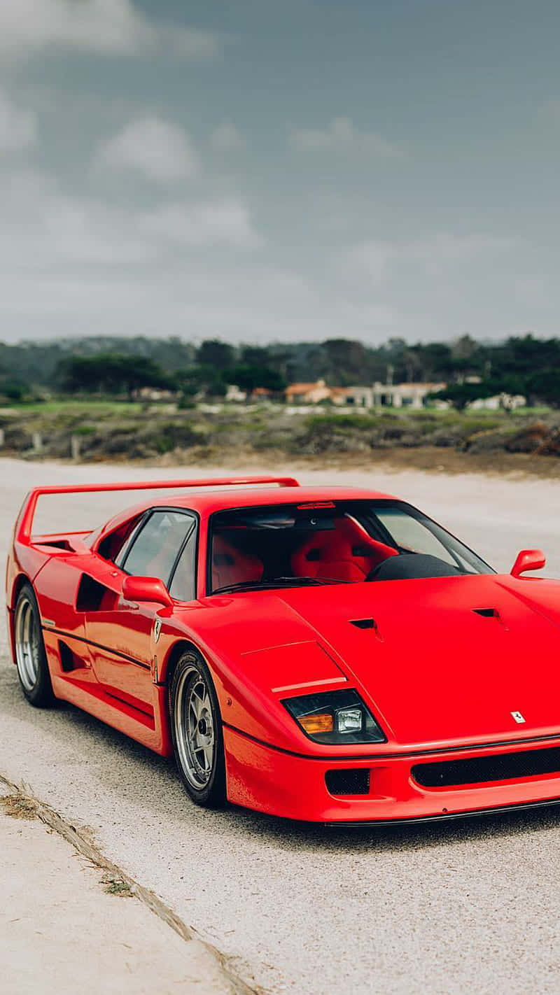 Take A Trip Back In Time With This Beautiful Vintage Ferrari Background