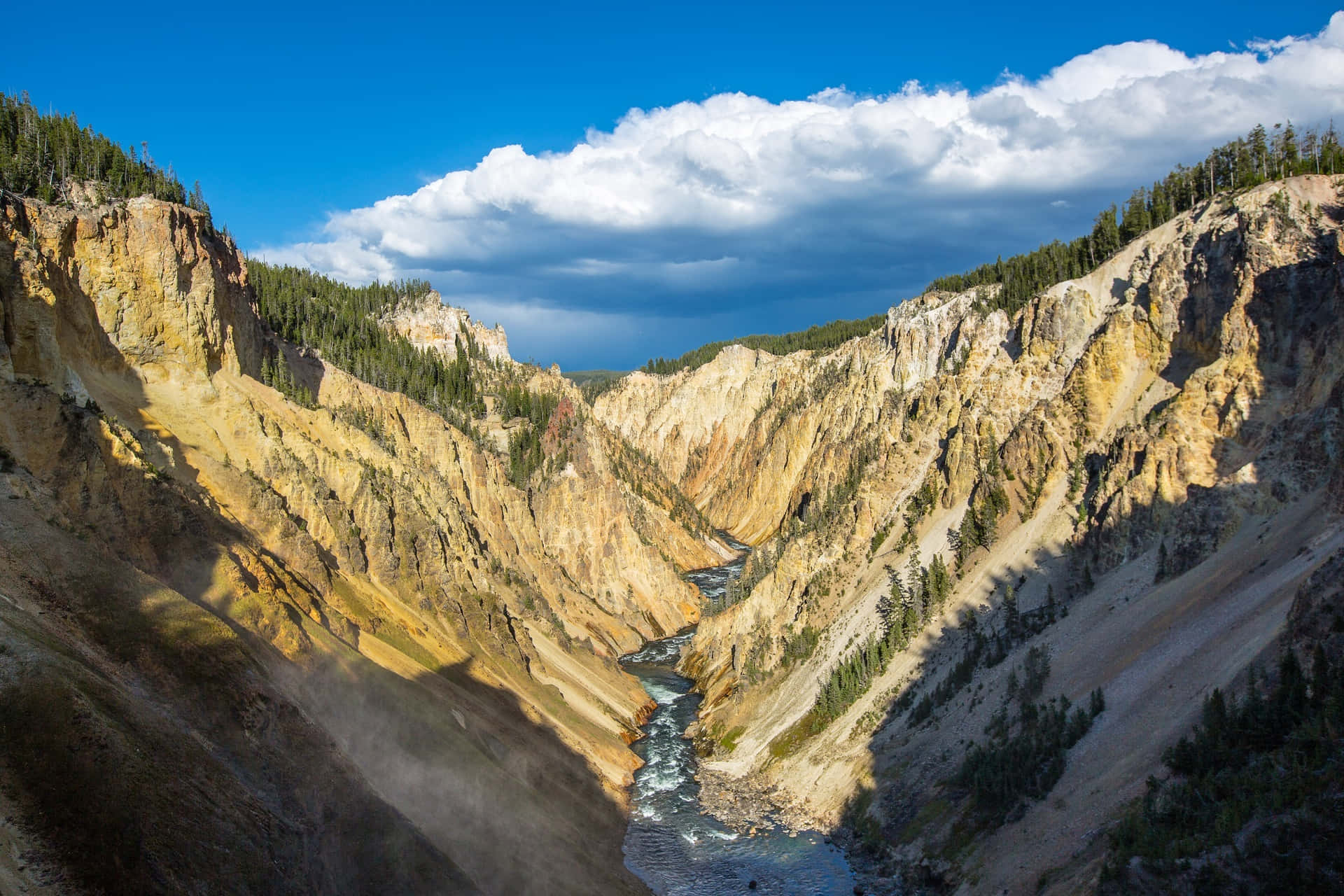 Take A Walk Through The Stunning Vista Of Yellowstone National Park Background