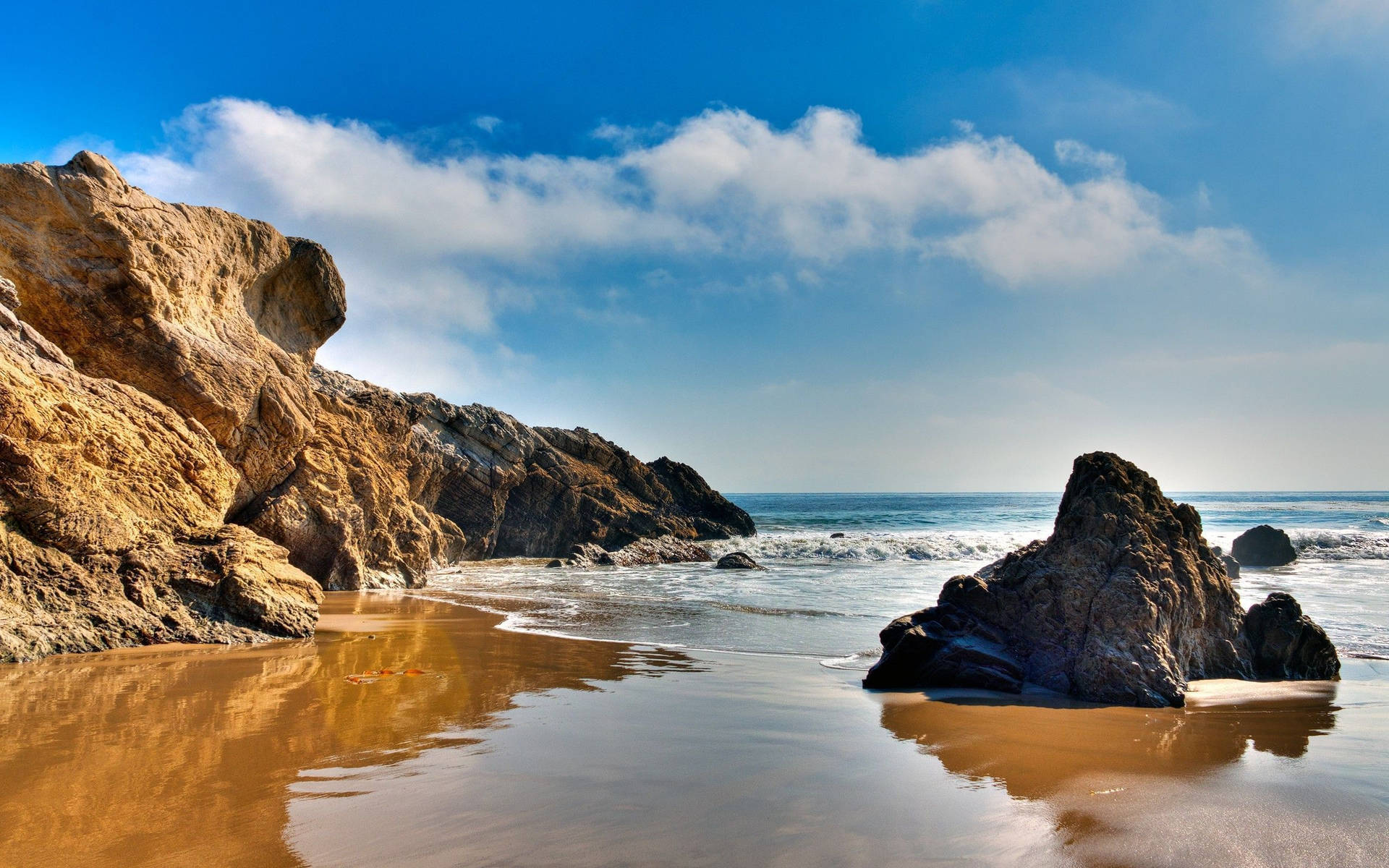 Take In The Beautiful Sunset Over Malibu California Background