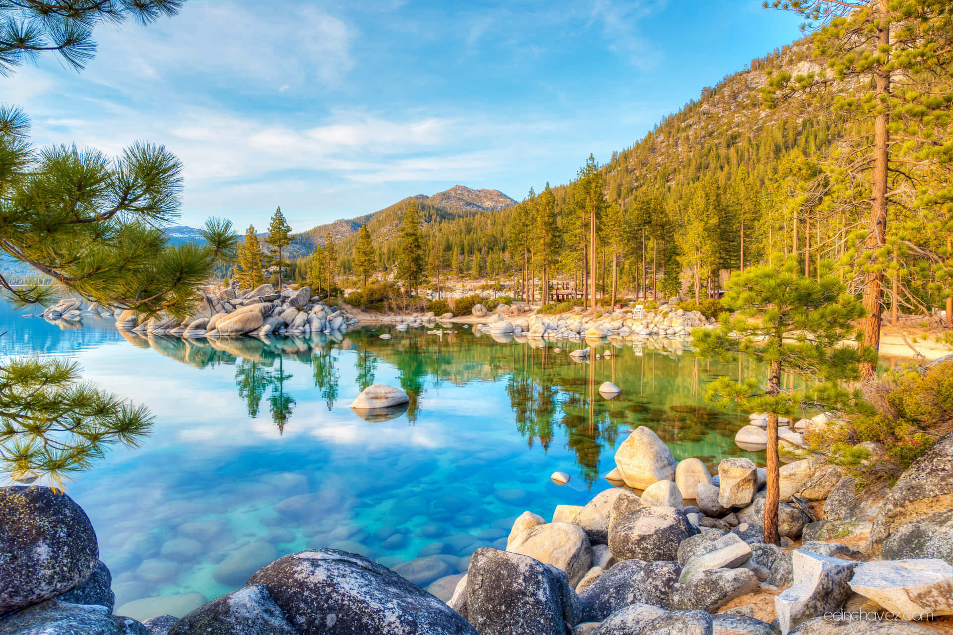 Take In The Breathtaking Views Of Lake Tahoe With Its Picturesque Snow-capped Mountains And Crystal Blue Waters. Background