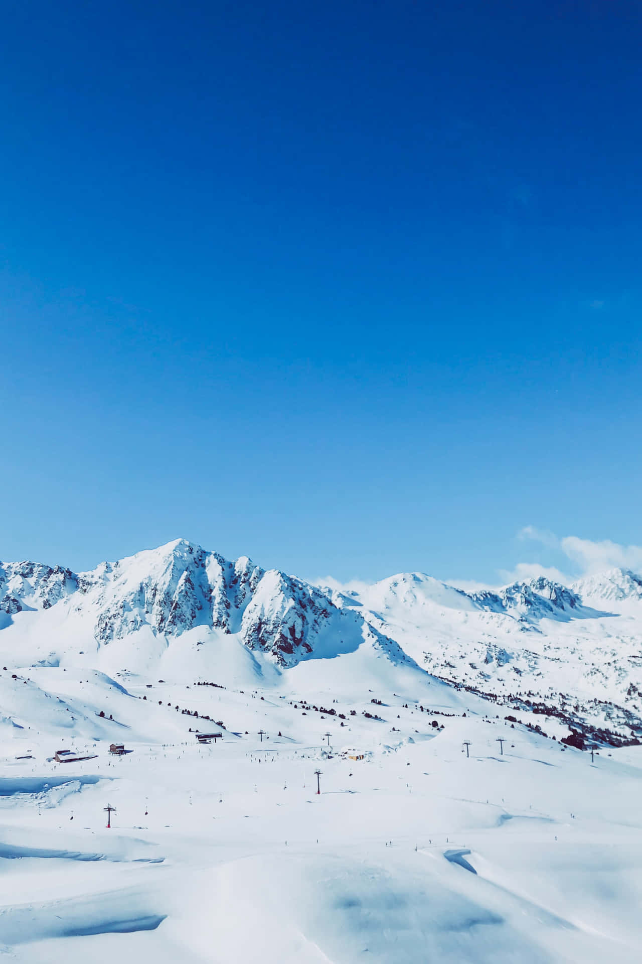 Take In The Splendid Views At A Ski Mountain Background