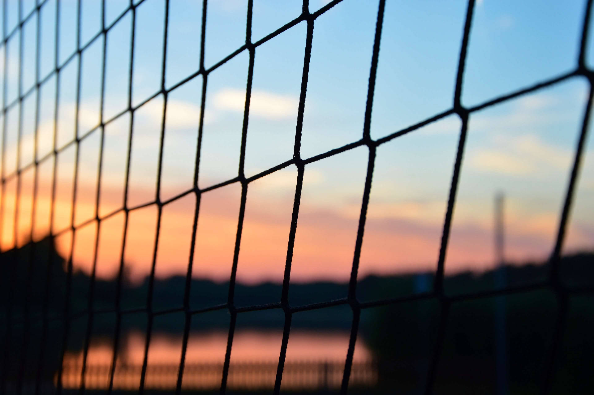 Take On The Volleyball Court With Your Trusty Laptop Background