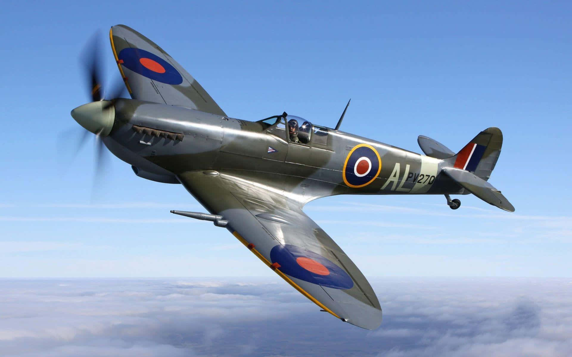 Take To The Skies In A Spitfire Fighter Plane Background