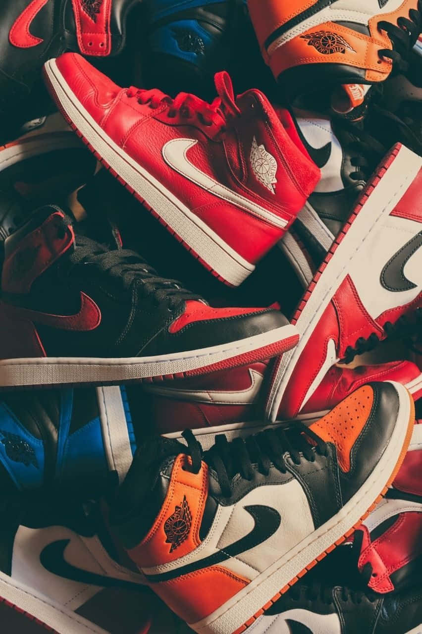Take Your Pick From This Colourful Variety Of Stylish Sneakers Background